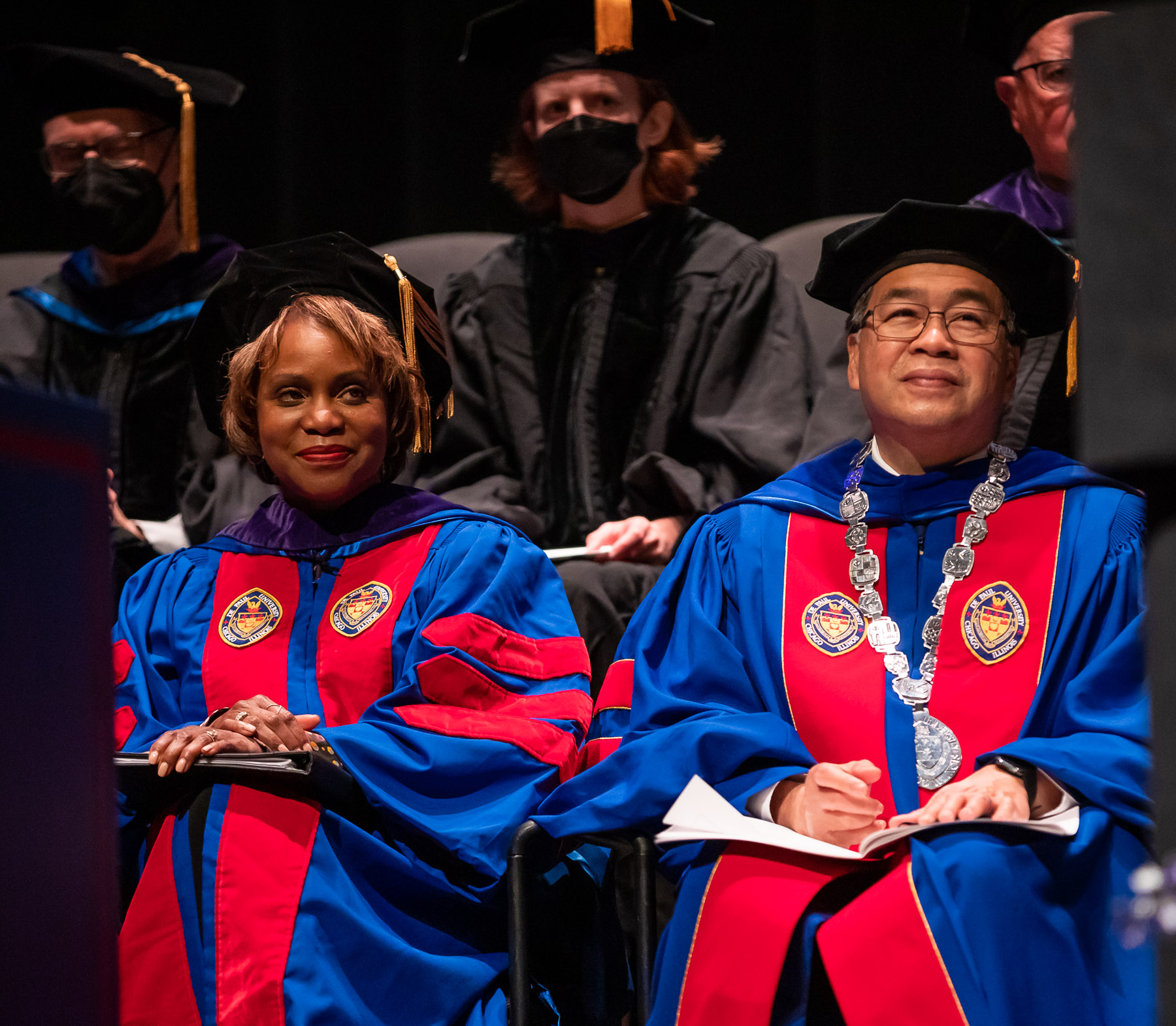 Natalye Paquin, right, and A. Gabriel Esteban, president of DePaul, at the College of Law commencement.